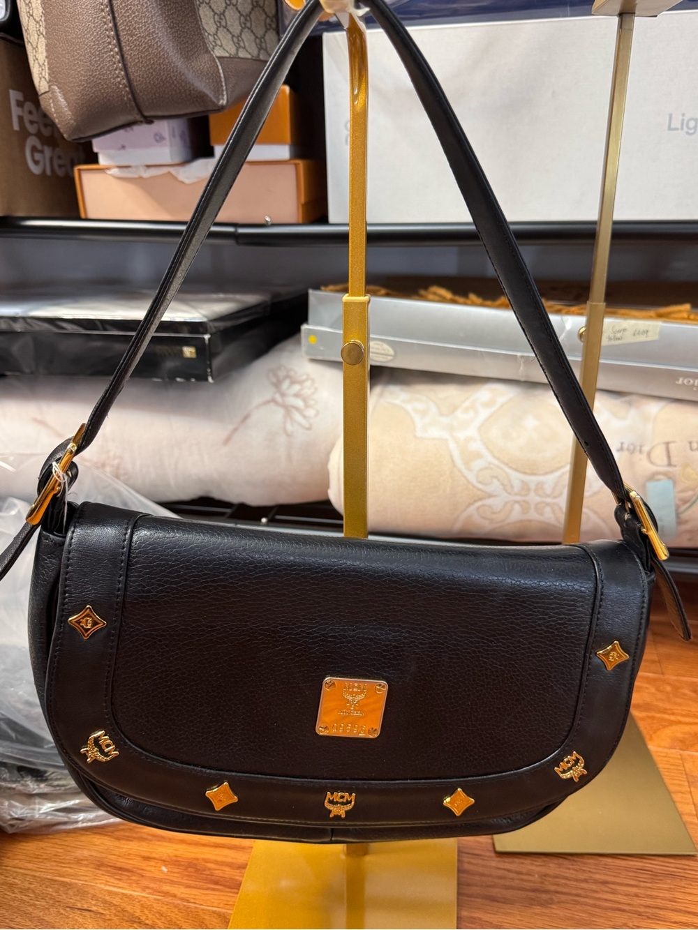 MCM Black Leather Shoulder Saddle Bag with Gold Accents